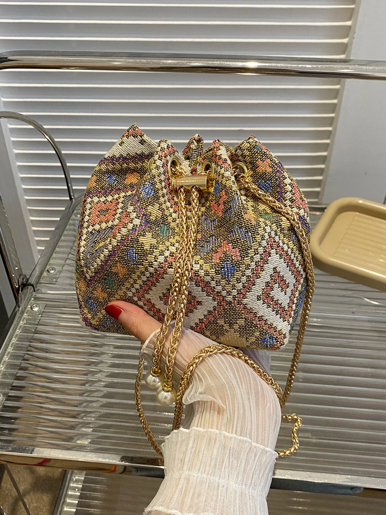 Fashion Solid Color Hollow Out Woven Chain Drawstring Mini Crossbody Bucket Bag