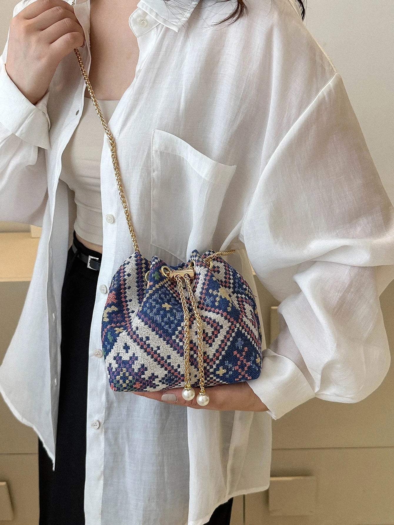 Fashion Solid Color Hollow Out Woven Chain Drawstring Mini Crossbody Bucket Bag