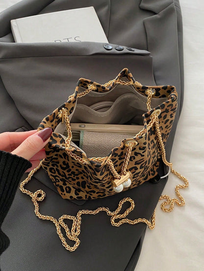 Fashion Solid Color Hollow Out Woven Chain Drawstring Mini Crossbody Bucket Bag