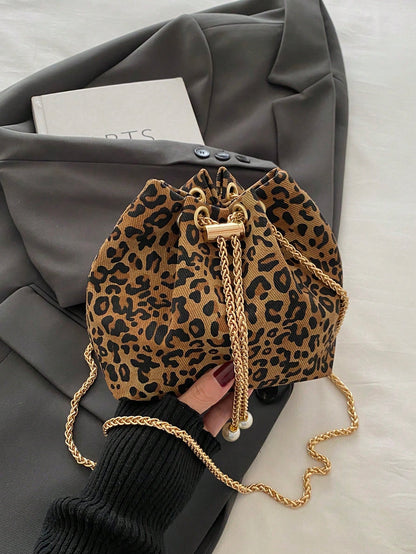 Fashion Solid Color Hollow Out Woven Chain Drawstring Mini Crossbody Bucket Bag